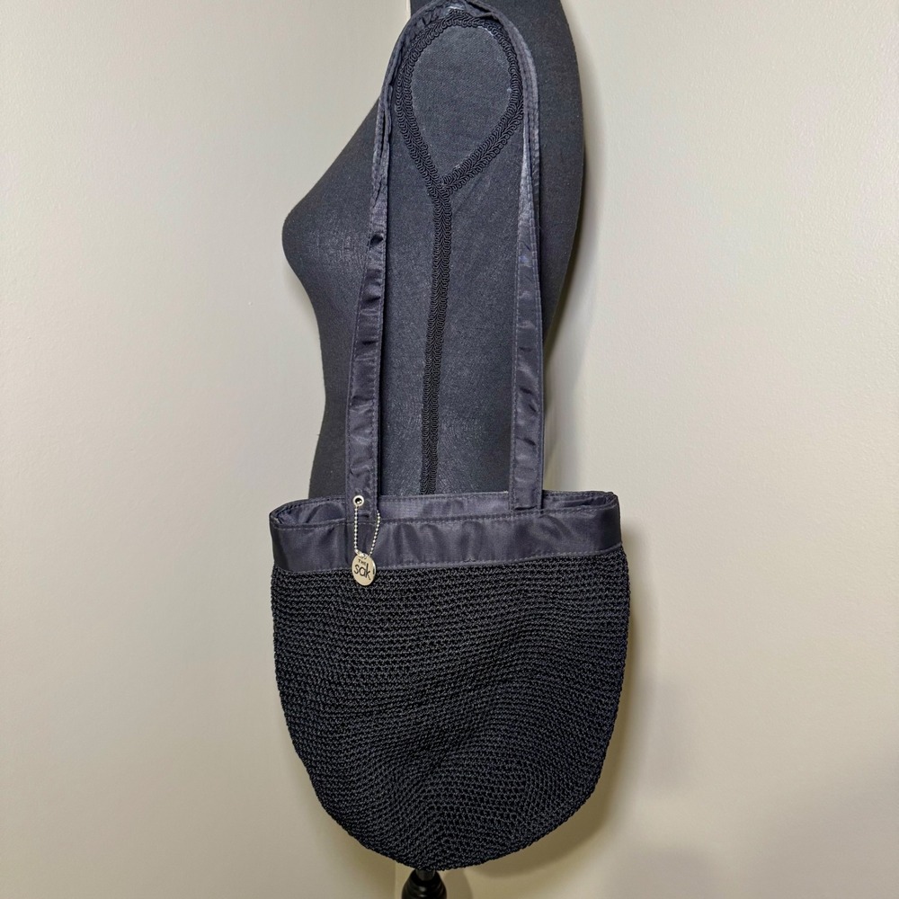 The Sak Black Crochet Shoulder Bag Woven Tote Satin Trim Silver‎ Logo Charm